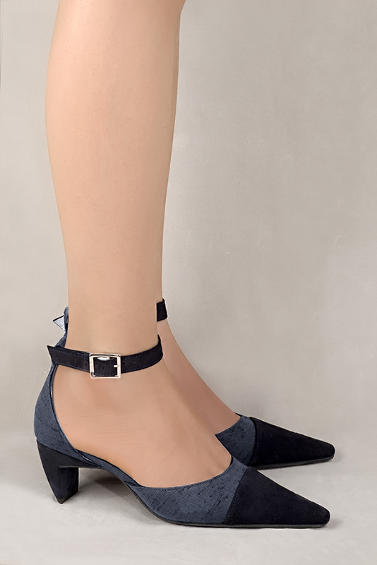 Midnight blue women's open side shoes, with a strap around the ankle. Tapered toe. Medium comma heels. Worn view - Florence KOOIJMAN